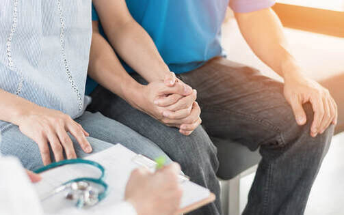 couple-during-a-counselling-session-discussing-intimacy-issues-with-a-therapist-essential-mens-clinic-blog-image-1_orig